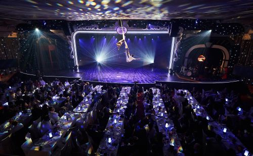 Two aerial acrobats on stage during the Europa-Park Dinner-Show.