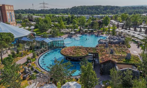 Aerial view of the Rulantica water world. The large outdoor pool, Svømmepøl, can be seen.