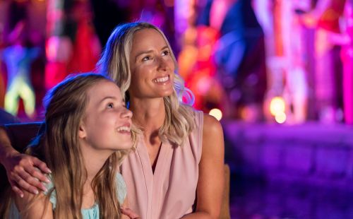A mother and daughter are marvelling at the themed decor of the 'Pirates in Batavia' attraction at Europa-Park.
